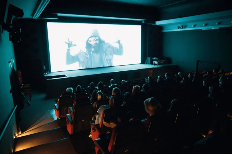 Darkness as a Feature: Why People Are Paying $80 to Watch a Movie in a Room Full of Strangers